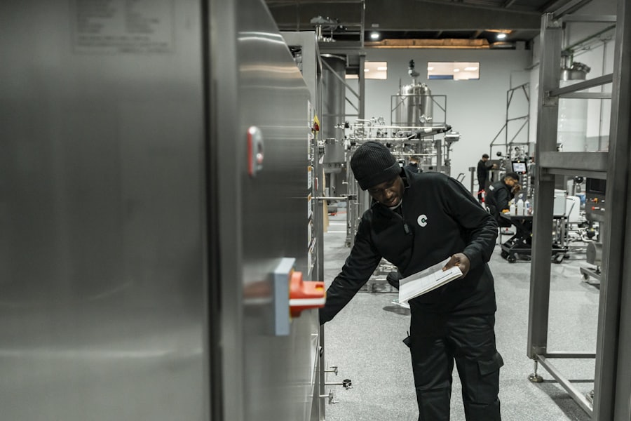 Engineer checking equipment in a modern process plant